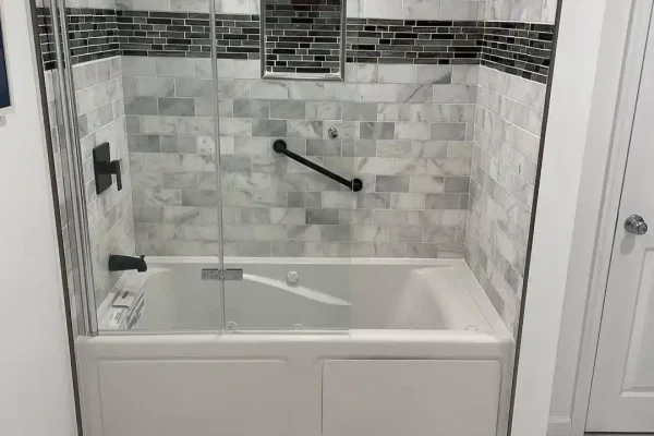 Tiler and plaster repair work laying tile, trowel